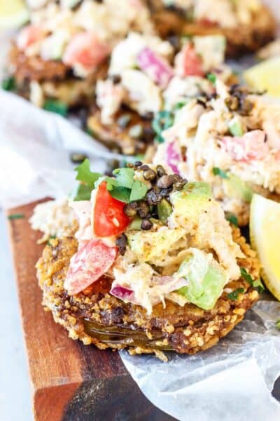 Keto Fried Green Tomatoes topped with a crab avocado salsa