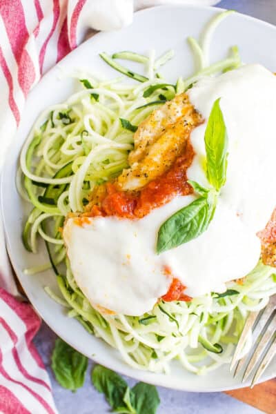 Keto Chicken Parmesan on a bed of zucchini noodles