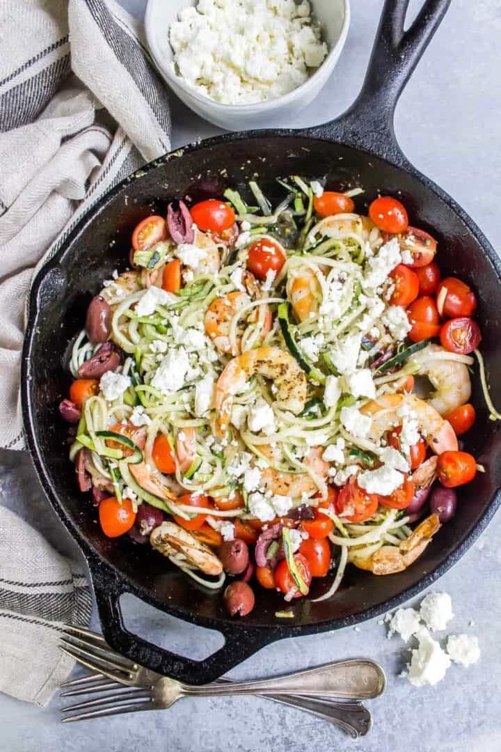 Mediterranean Keto Shrimp Zoodles in a cast iron skillet