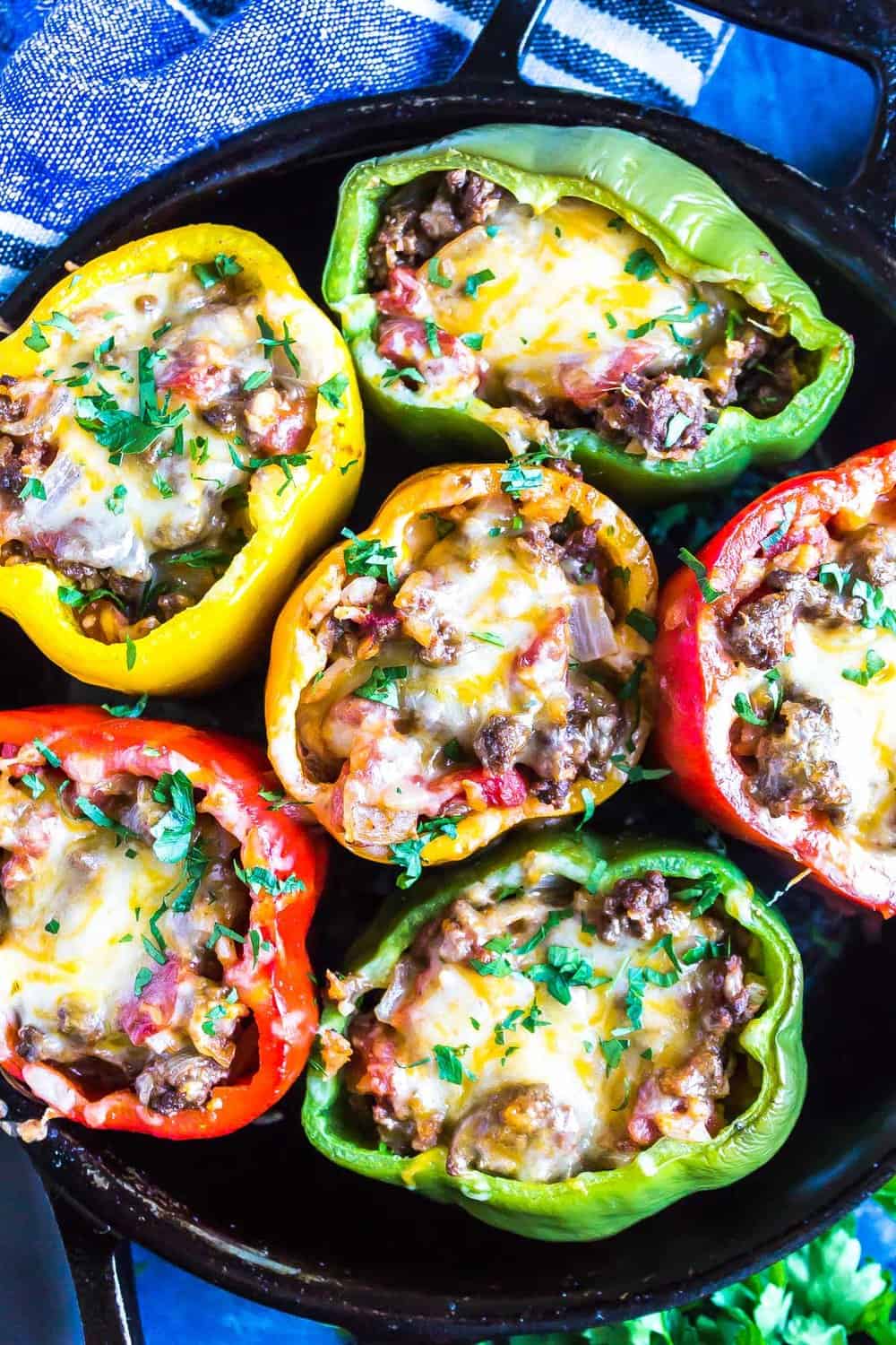 Keto Stuffed Peppers in a cast iron skillet
