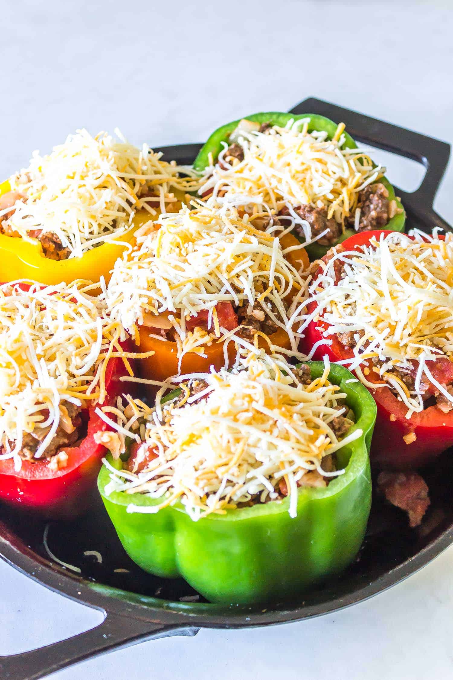 stuffed peppers topped with cheese