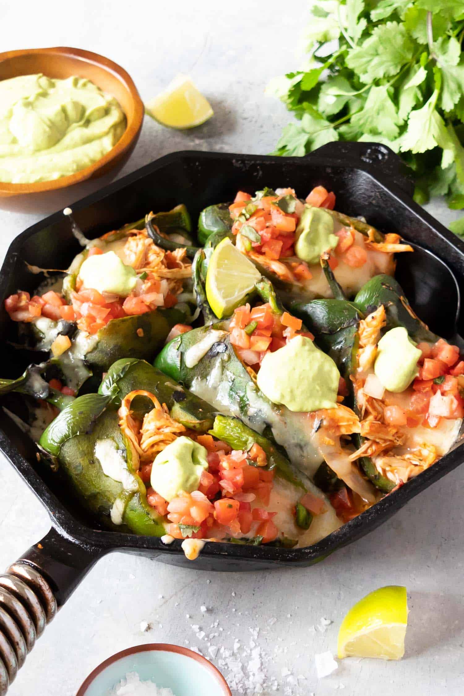 Chicken Stuffed Poblano Peppers in cast iron skillet
