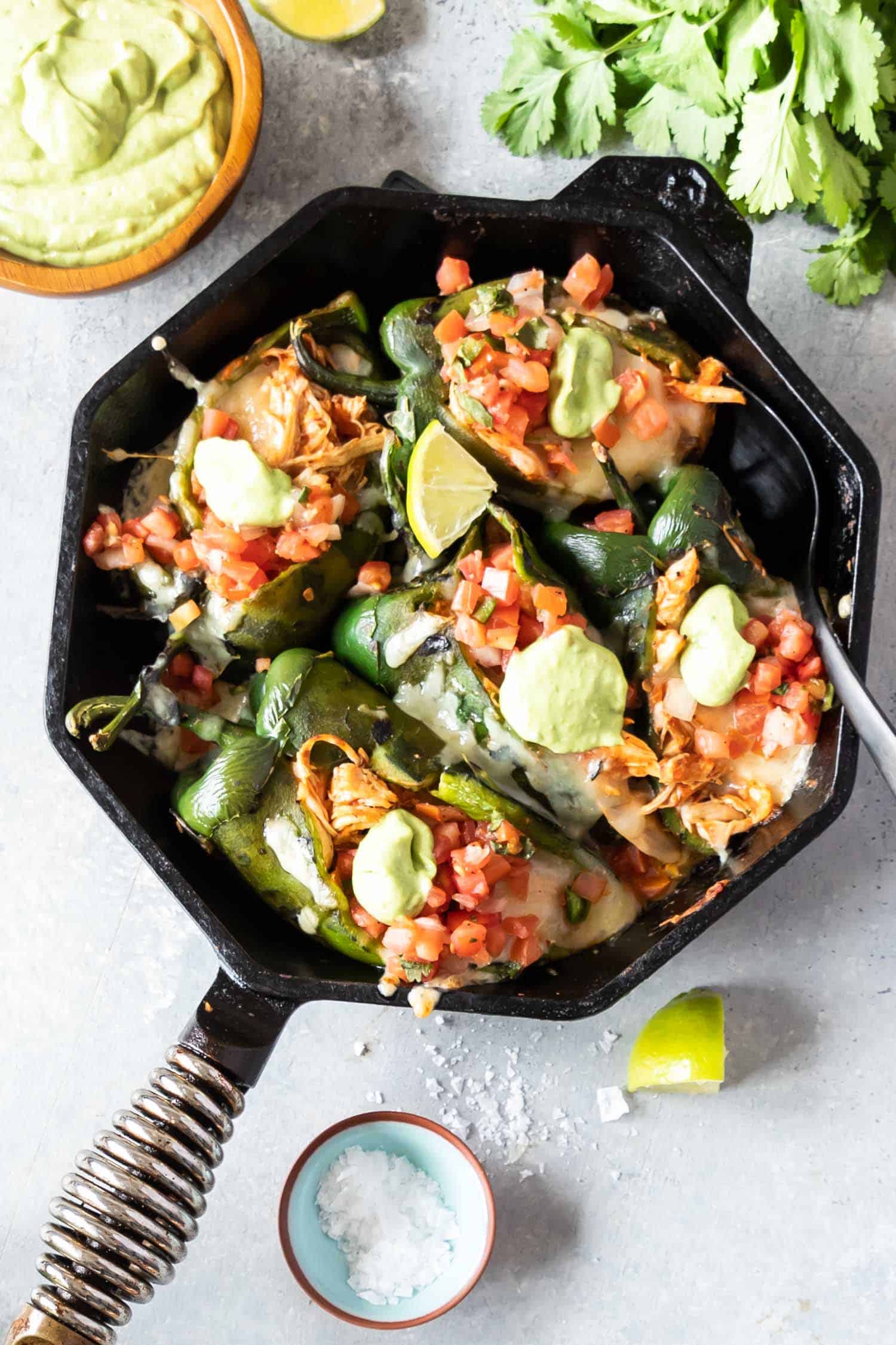 Chicken Stuffed Poblano Peppers in cast iron skillet
