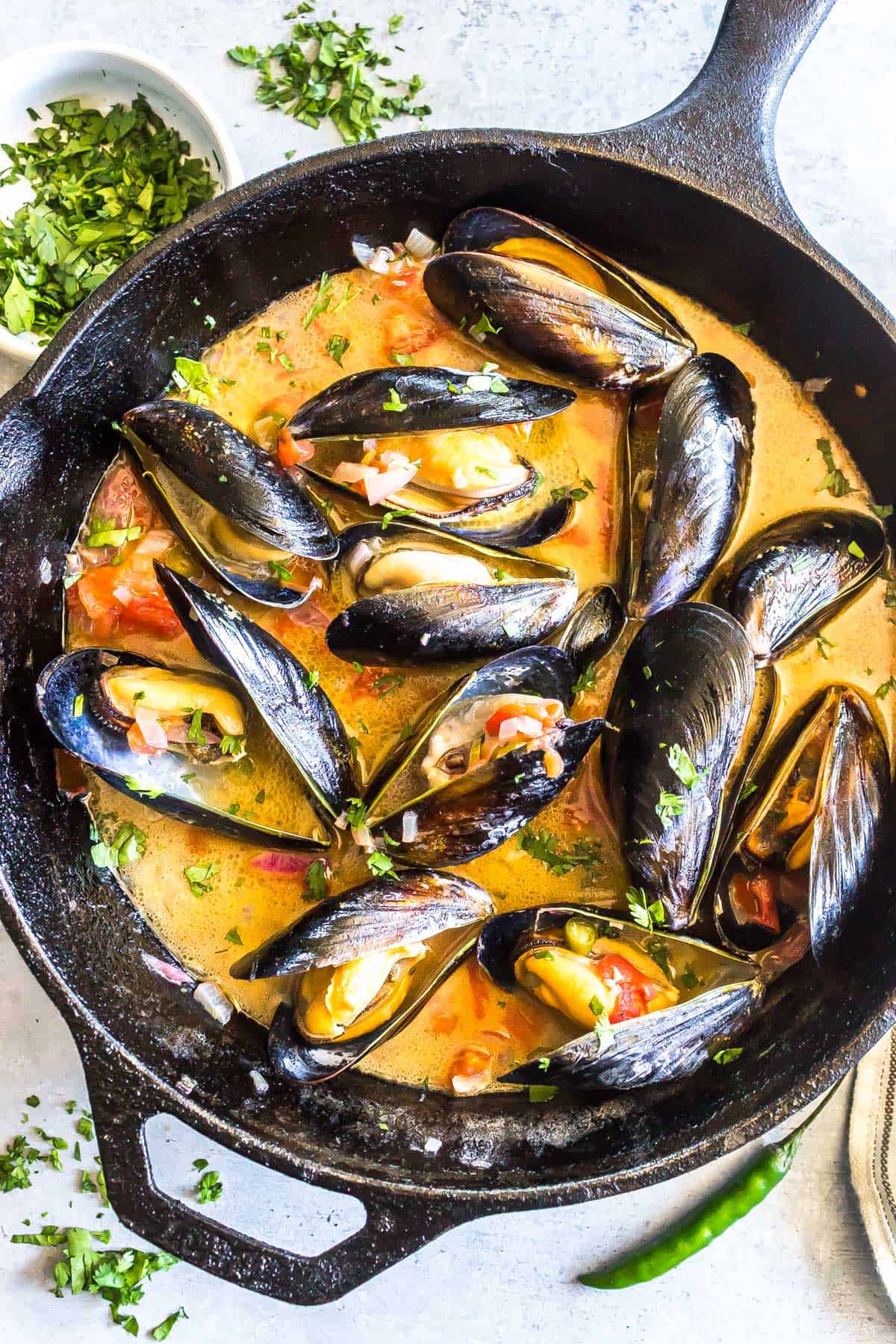 Chilli Mussels in a cast iron skillet