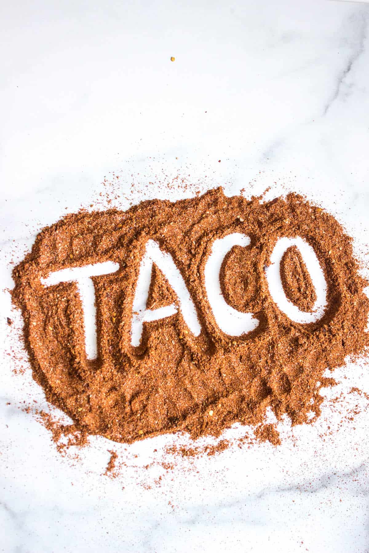 Homemade Taco Seasoning spread out with the word taco written in it