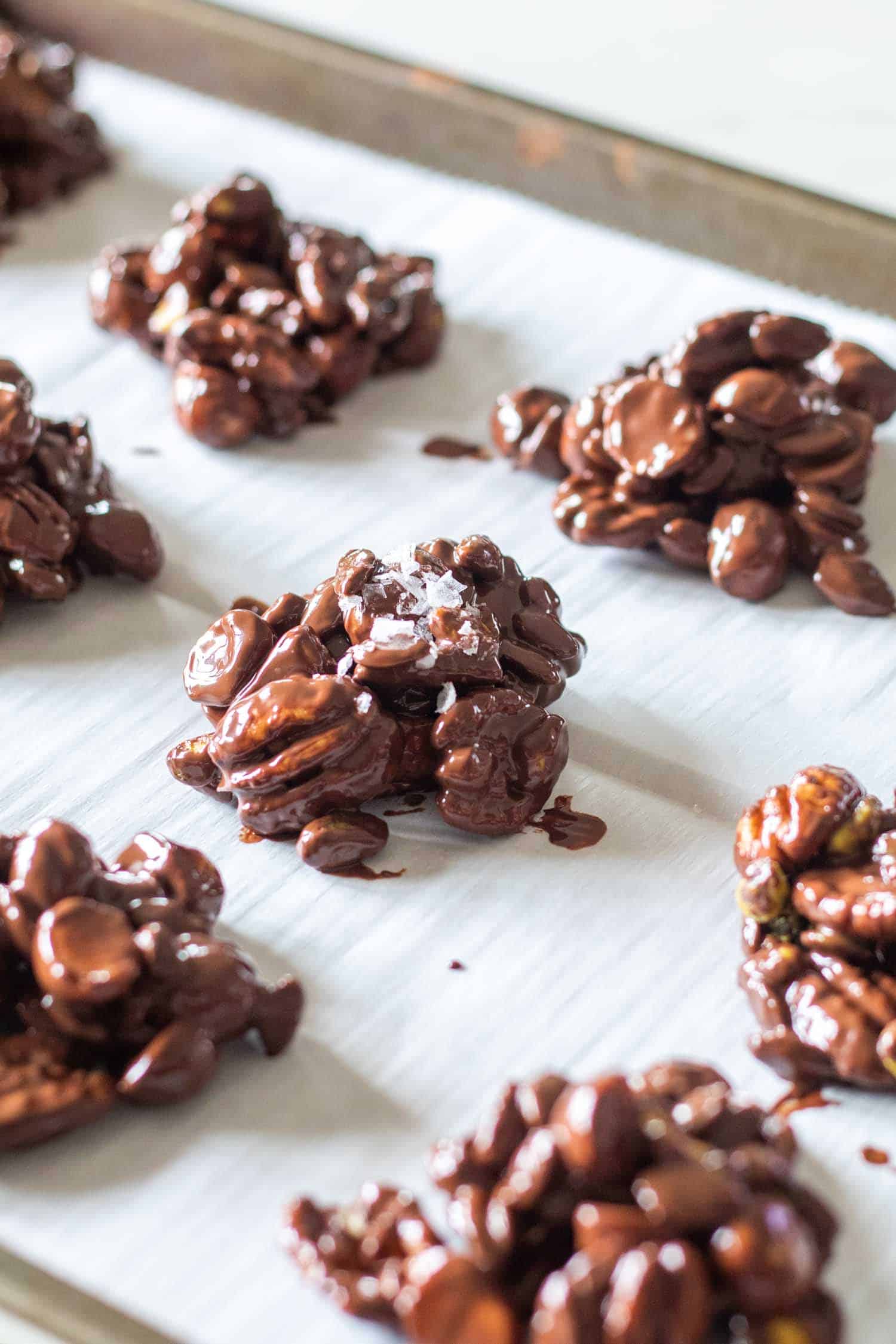 Keto Chocolate Fat Bomb Nut Clusters on white parchment paper
