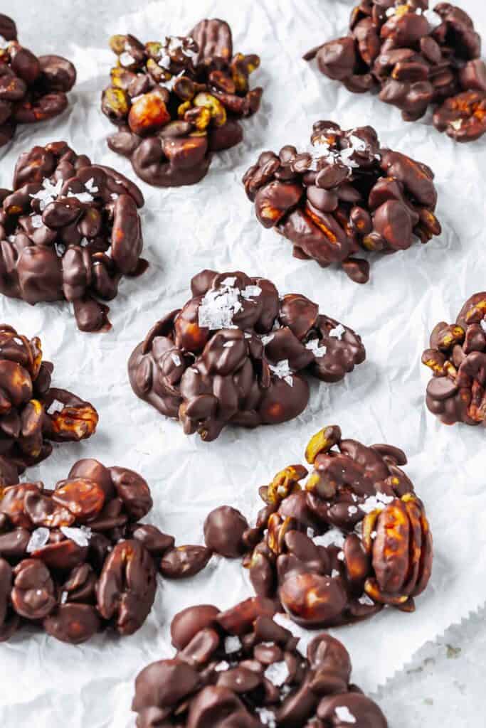 Keto Chocolate Fat Bomb Nut Clusters on white parchment paper