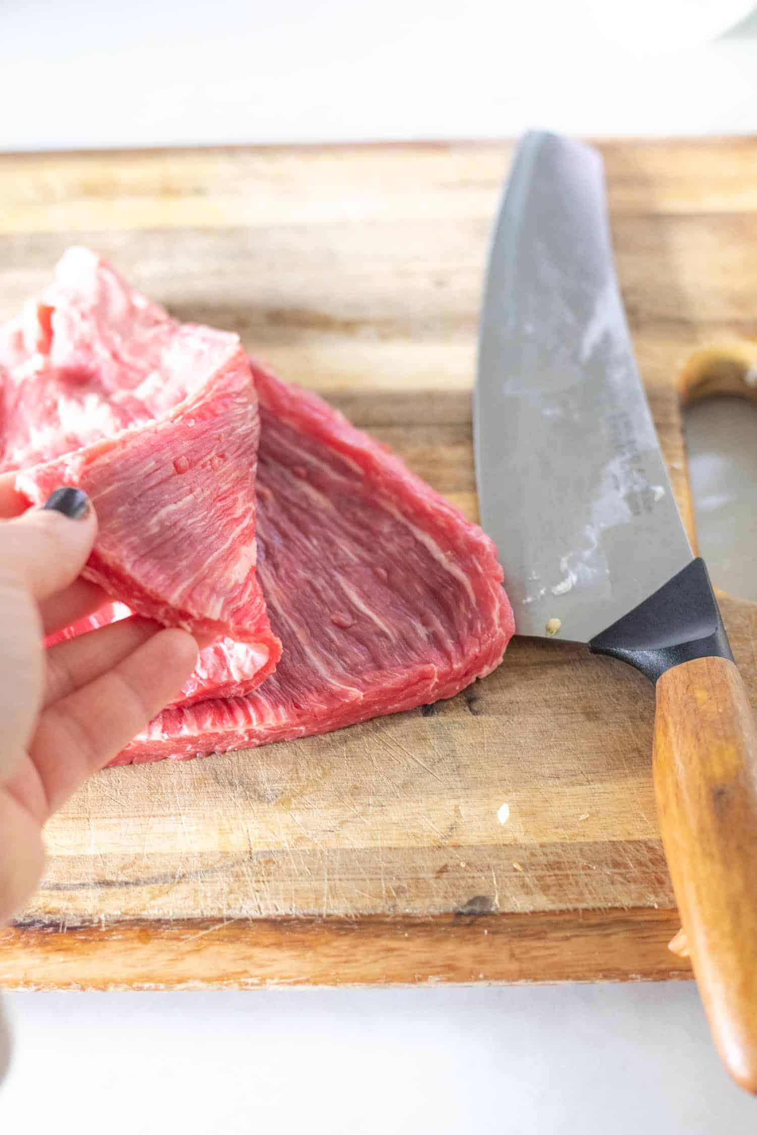 cutting the flank steak