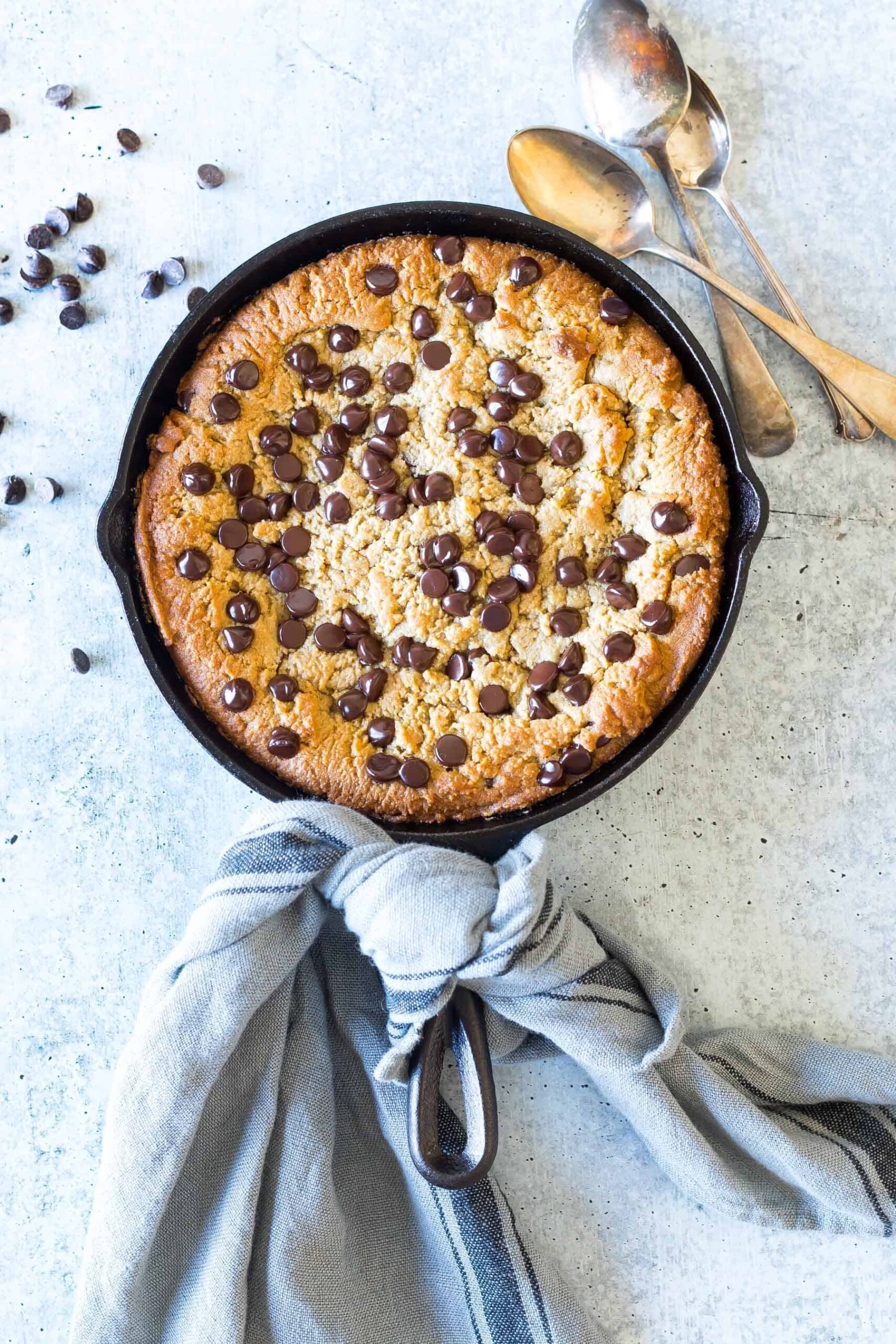 Finished Keto Chocolate Chip Peanut Butter Skillet Cookie in a 8 inch skillet