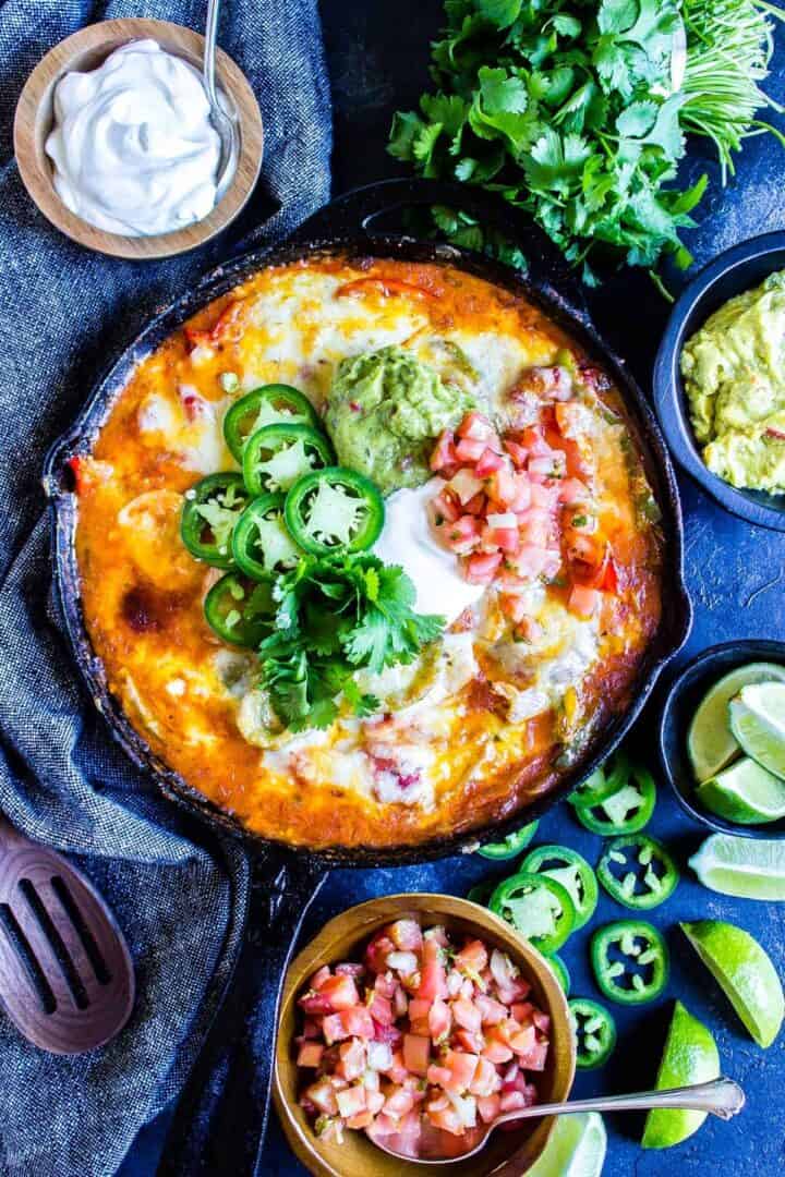 Keto Fajita Casserole Skillet surrounded by toppings