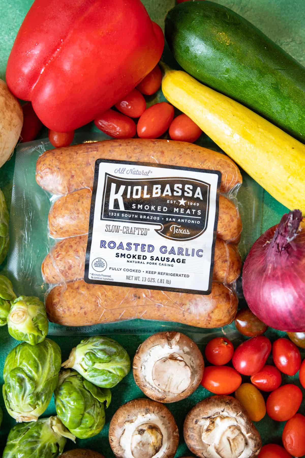 Kiolbassa Packaging surrounded by veggies