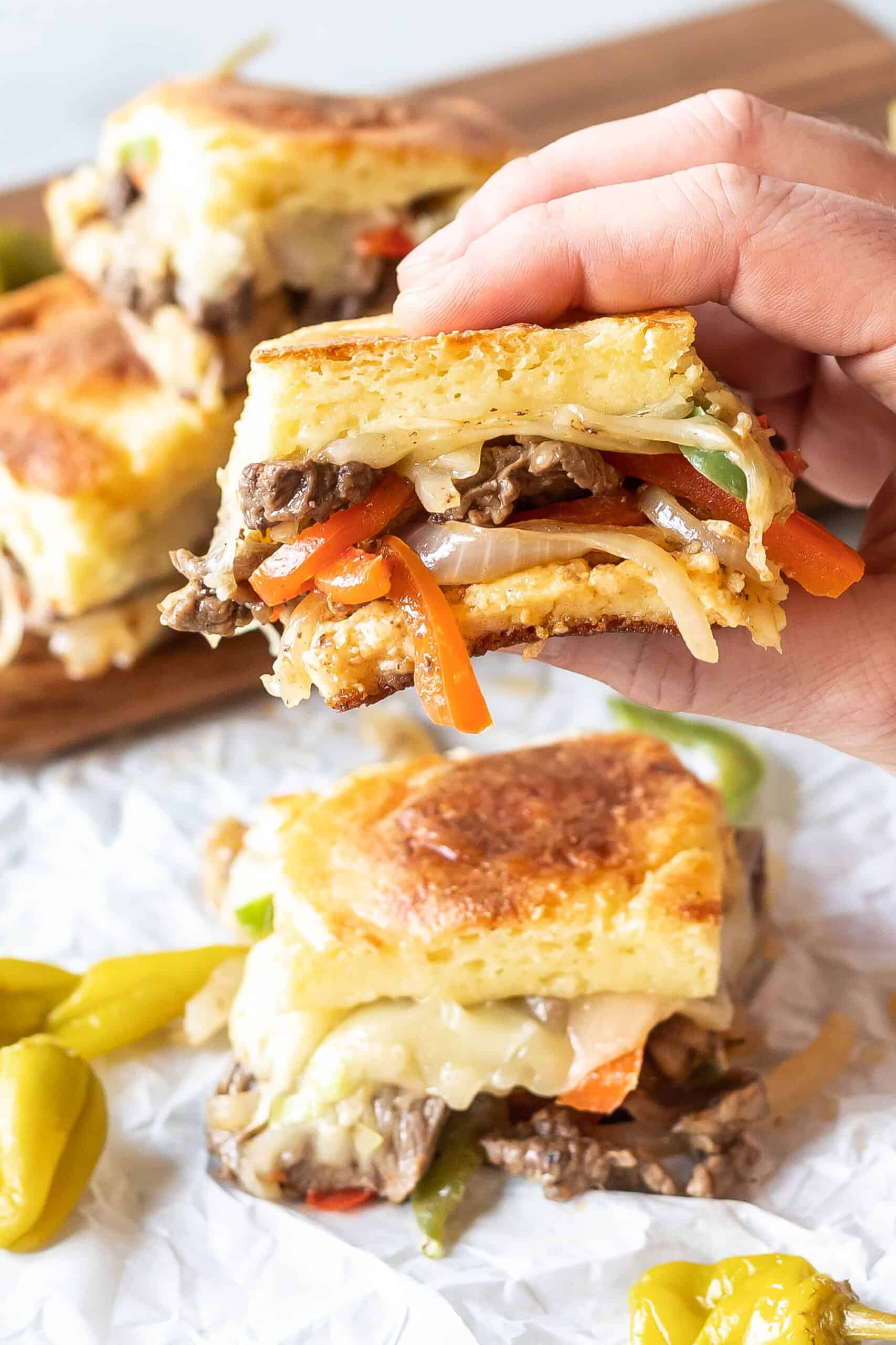 hand holding a Keto Philly Cheesesteak Slider