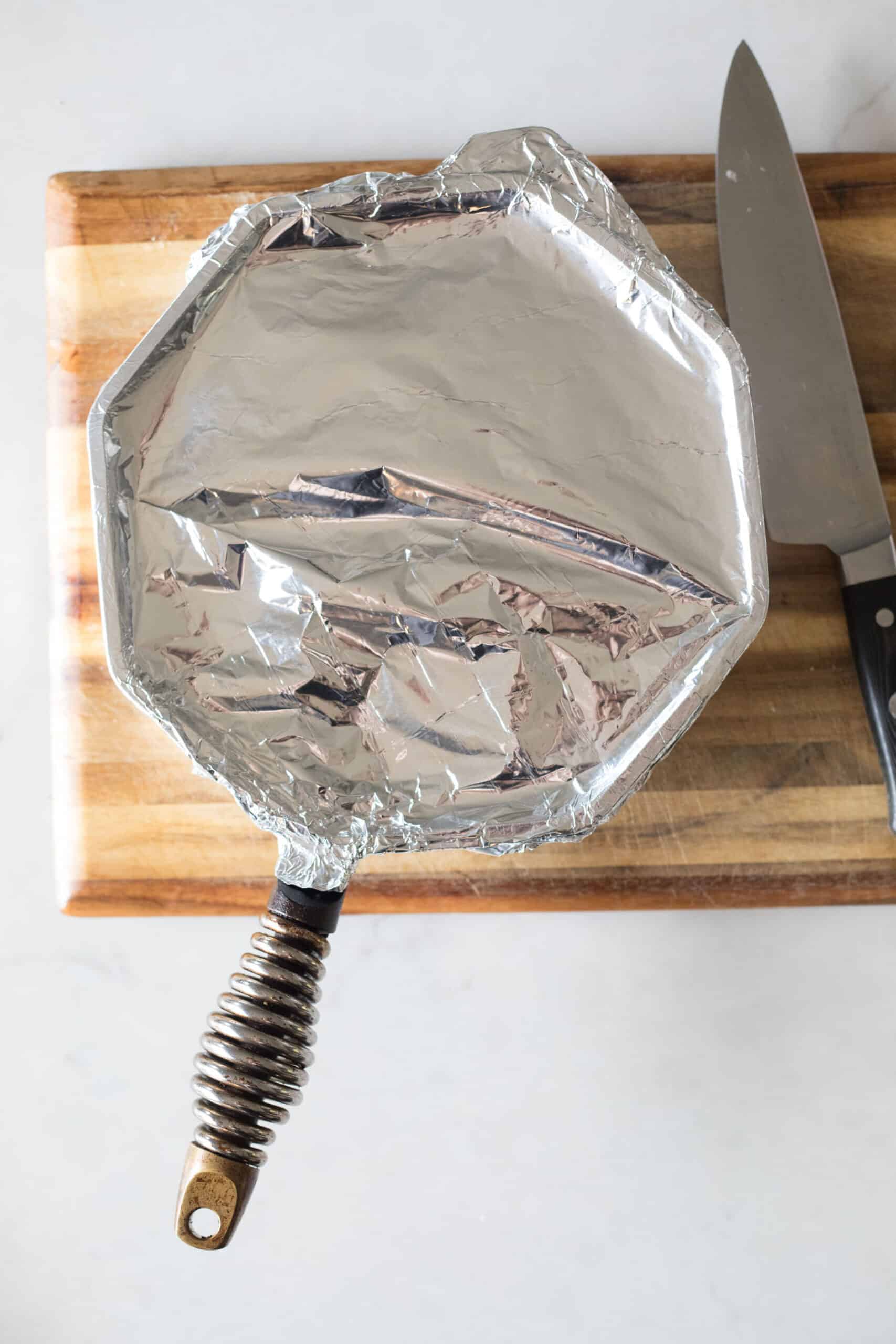 Cast Iron Skillet covered in aluminium foil