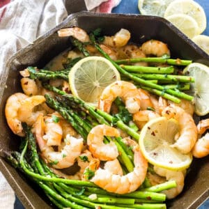 Finished dish: Keto Garlic Butter Shrimp and Asparagus in a cast iron skillet