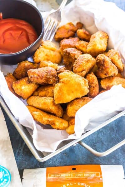 Keto Cheesy Chicken Poppers served with ketchup