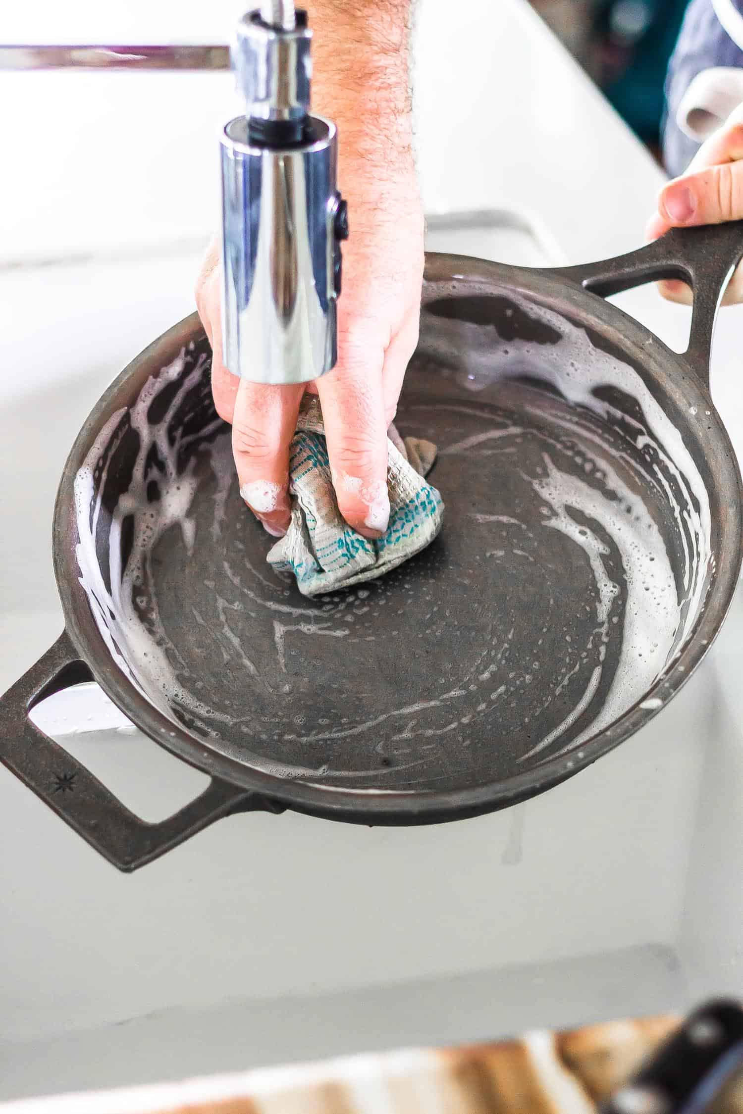 washing brand new cast iron skillet with soap before seasoning