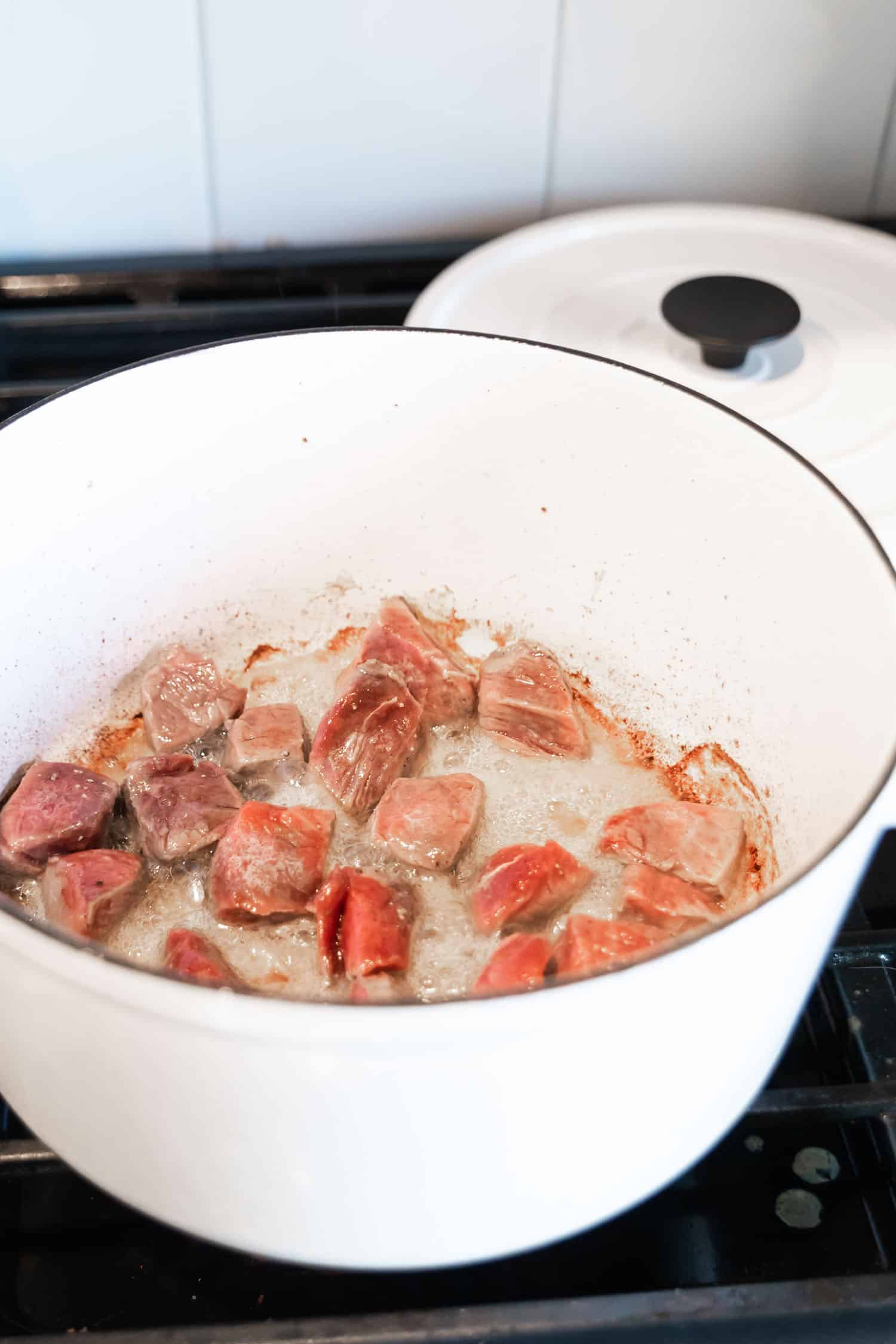 browning the beef stew meat in the Dutch oven