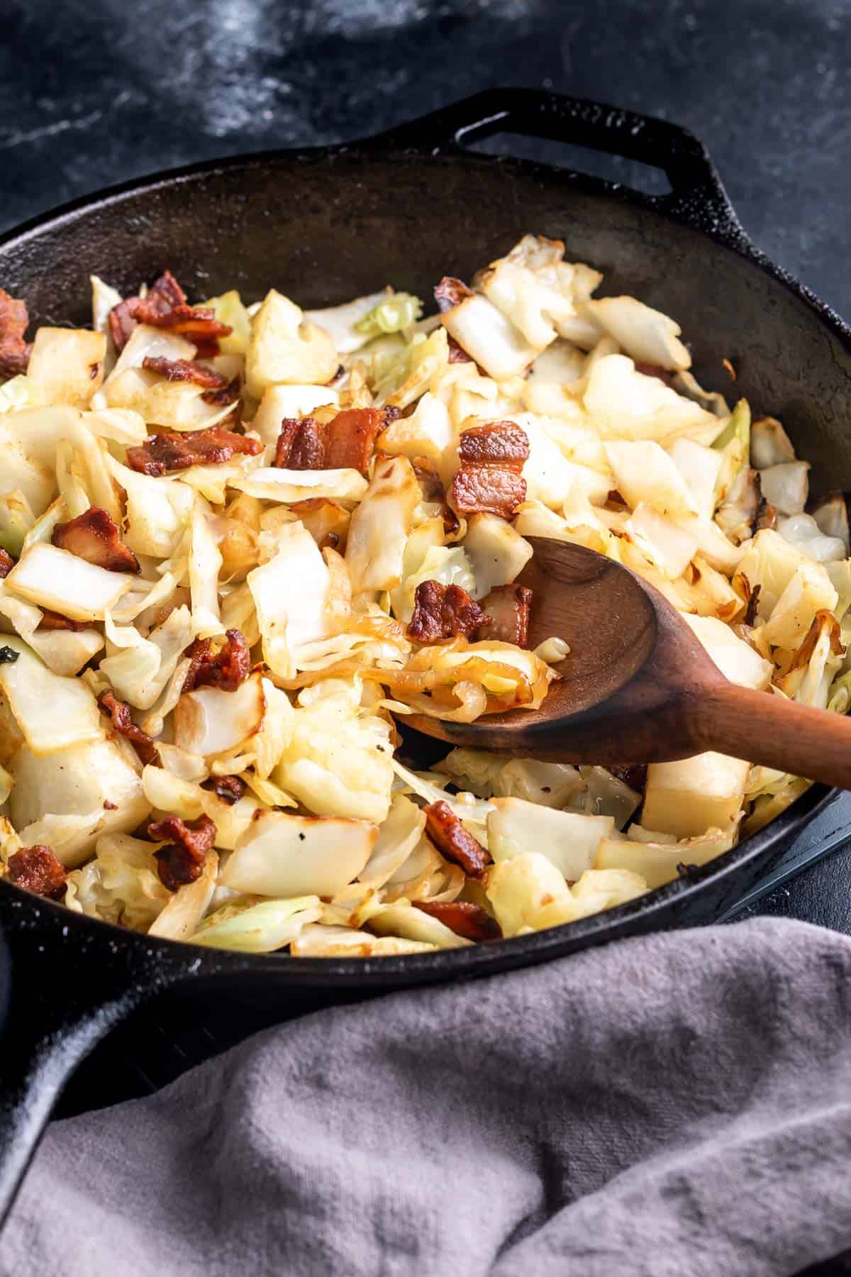 Keto Fried Cabbage in a cast iron skillet