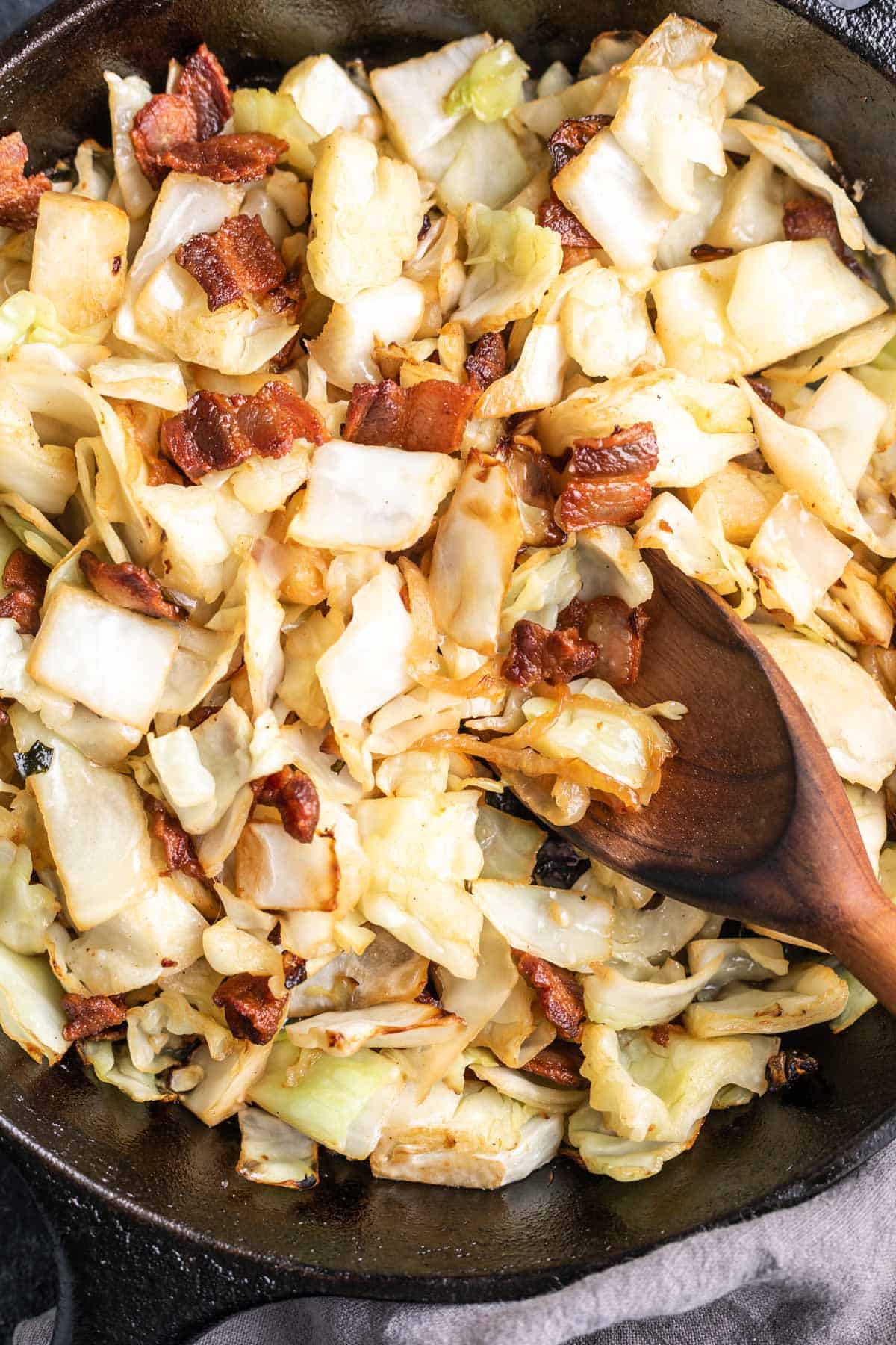 Keto Fried Cabbage in a cast iron skillet
