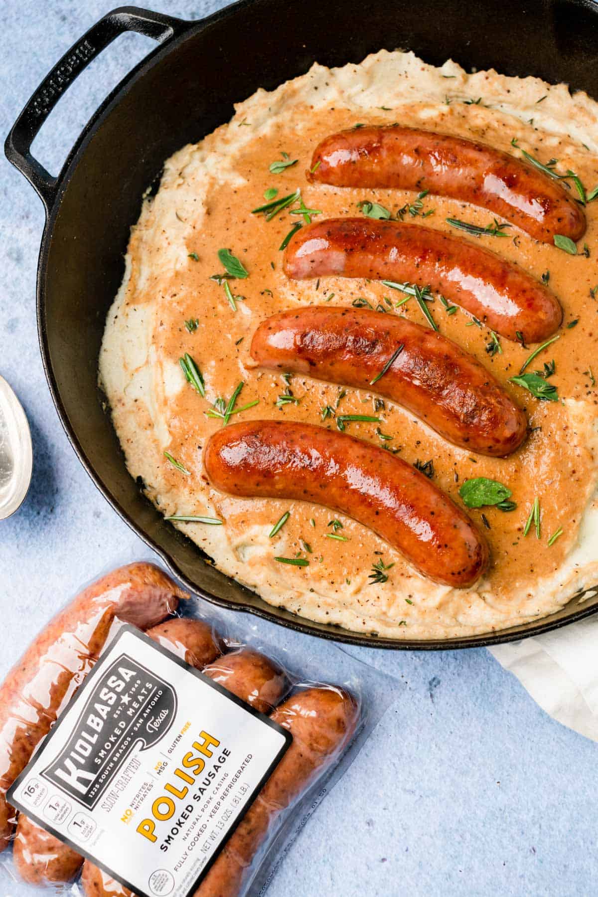 Keto Bangers and Mash in a cast iron skillet