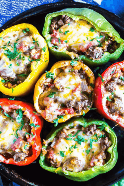Keto Stuffed Peppers in a cast iron skillet