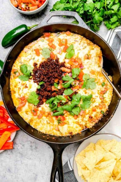 Queso Fundido with Chorizo in a cast iron skillet
