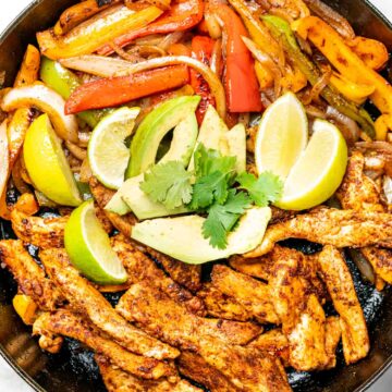 Keto Chicken Fajitas in a cast iron skillet