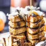 Keto Pumpkin Pancake stack being drizzled with sugar-free maple syrup
