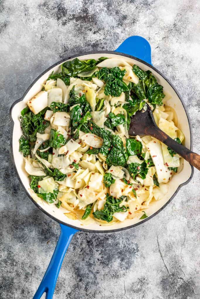 Sautéed Cabbage and Kale in a enameled cast-iron skillet
