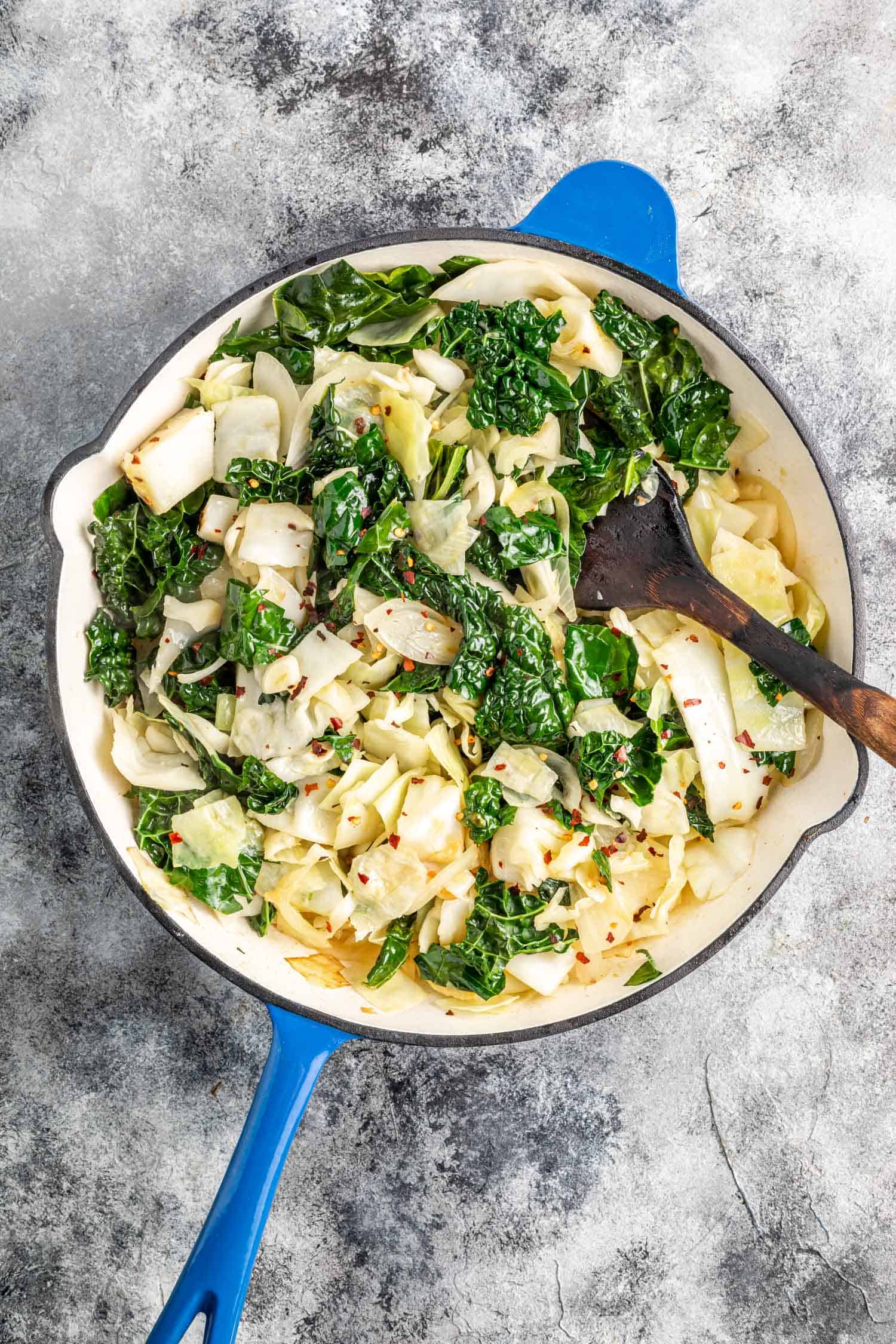 Sautéed Cabbage and Kale in a enameled cast-iron skillet