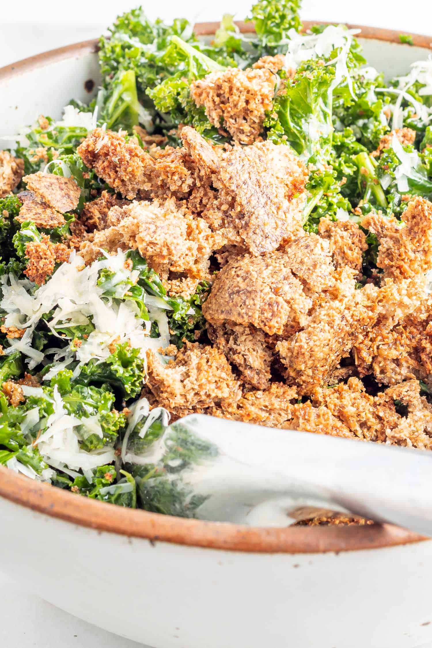 Keto Kale Salad topped with croutons