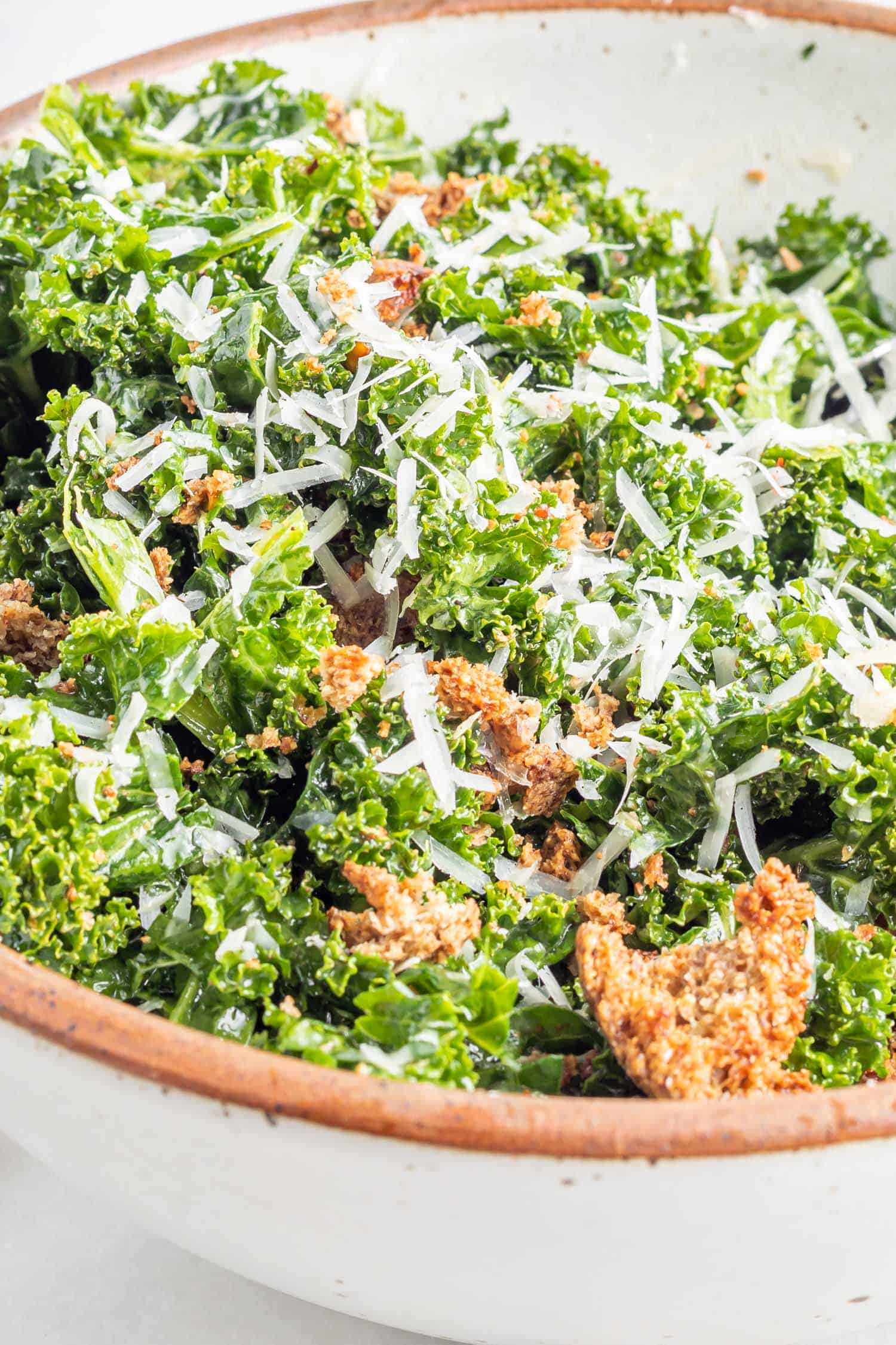 Keto Kale Salad in a white ceramic bowl