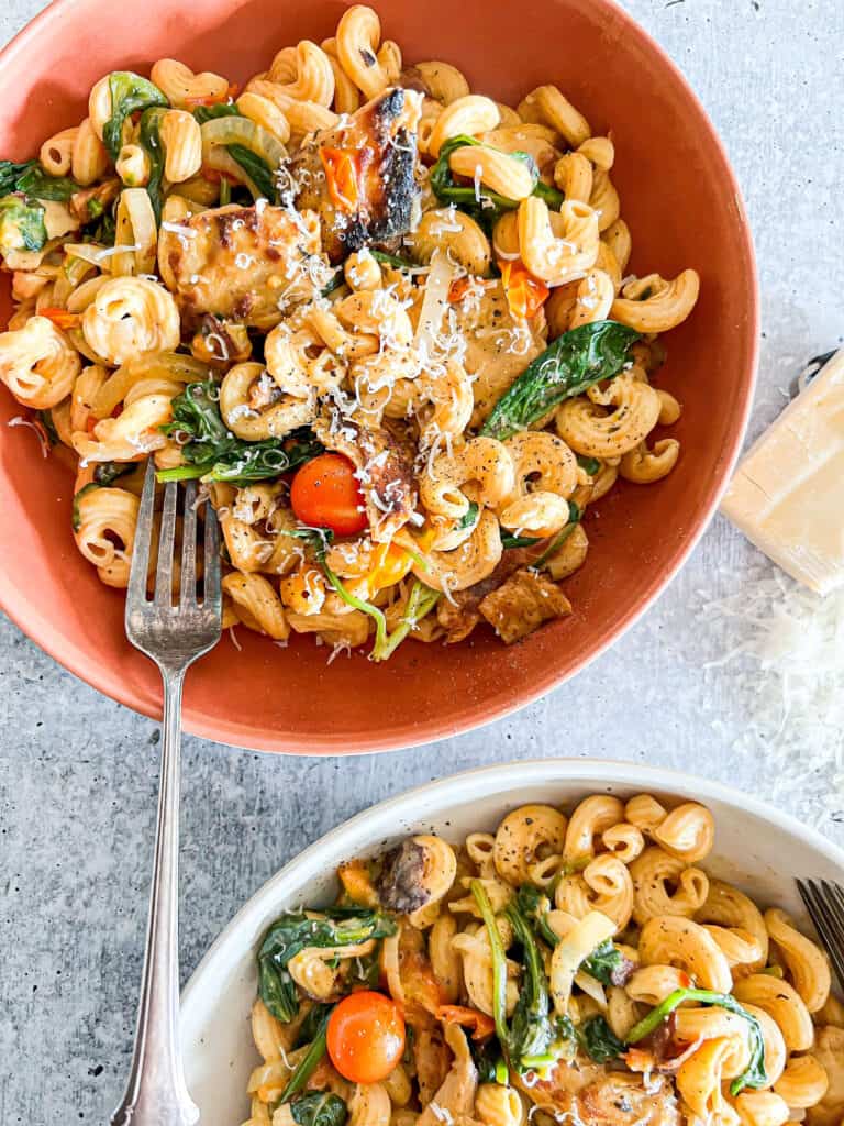 Cajun Chicken Alfredo Pasta in a brown bowl