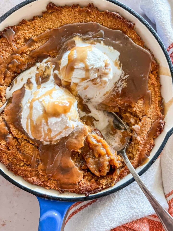 Caramel Chai Spice Pumpkin Cake in blue enameled cast iron skillet