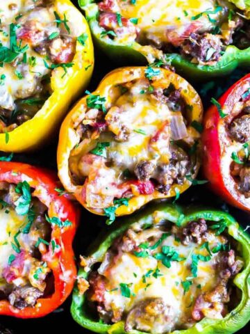keto stuffed peppers in a cast iron skillet