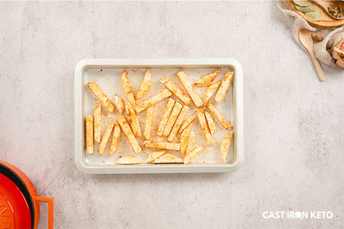 a tray of keto french fries sitting on top of a table.