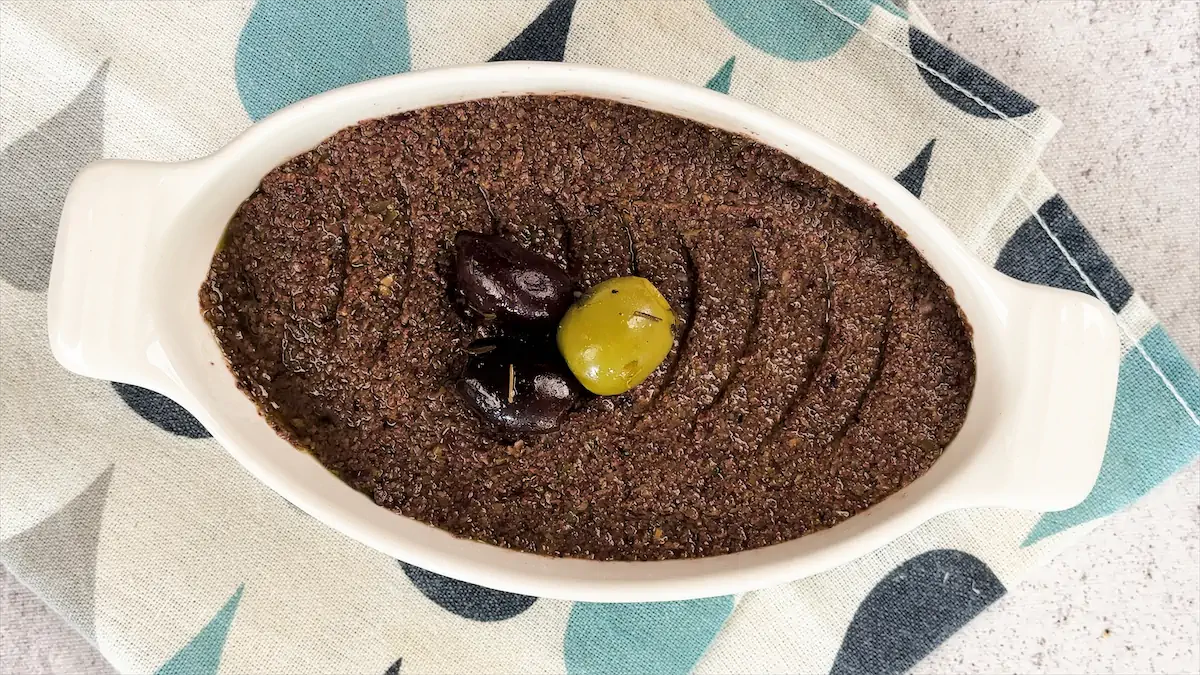 Classic Olive Tapenade ready on a serving bowl.