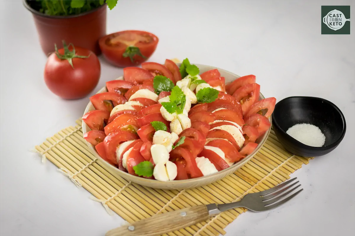 Caprese salad recipe served in a bowl.