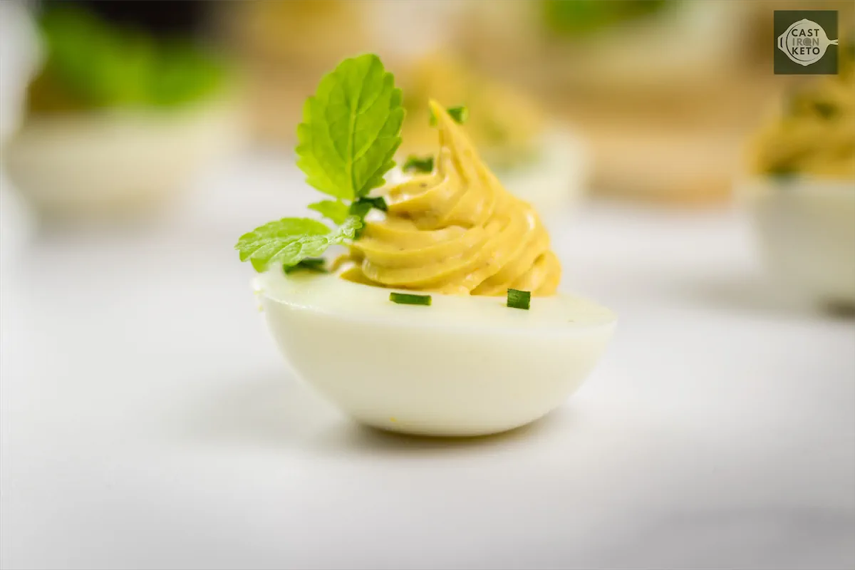 Keto deviled egg with toppings.