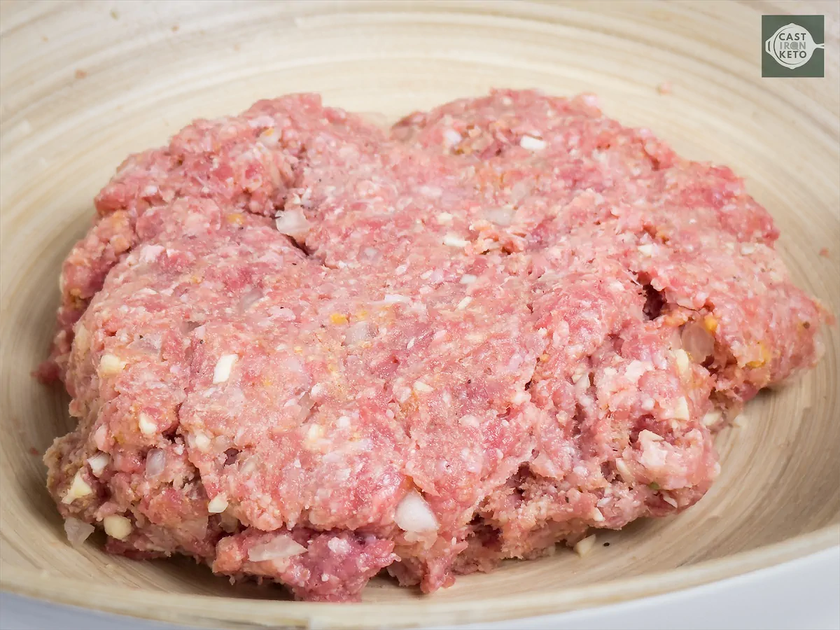 Ground beef and pork mixed with the ingredients to make meat dough.