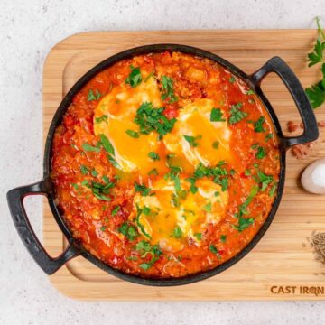 Keto Shakshuka in a cast iron skillet, ready to be served.