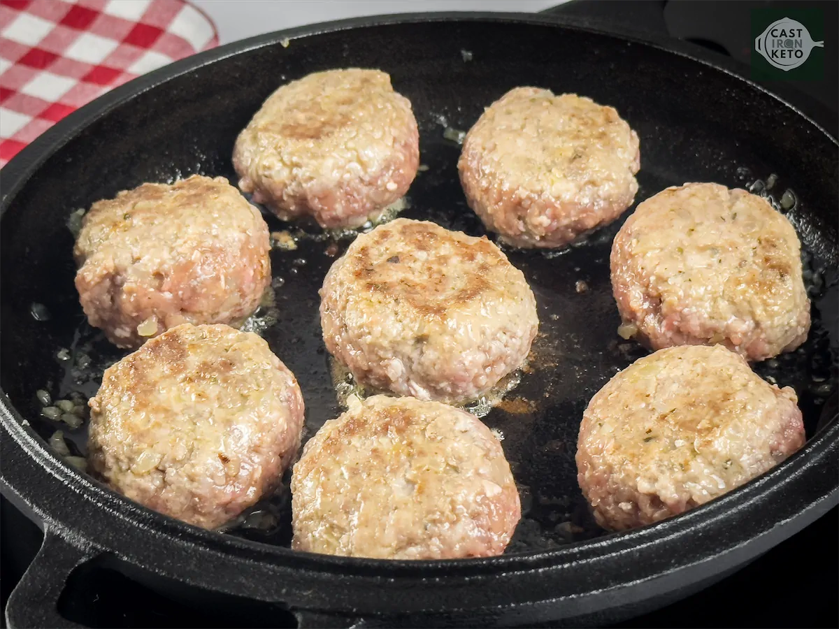 Browned Swedish meatballs in a cast iron pan.