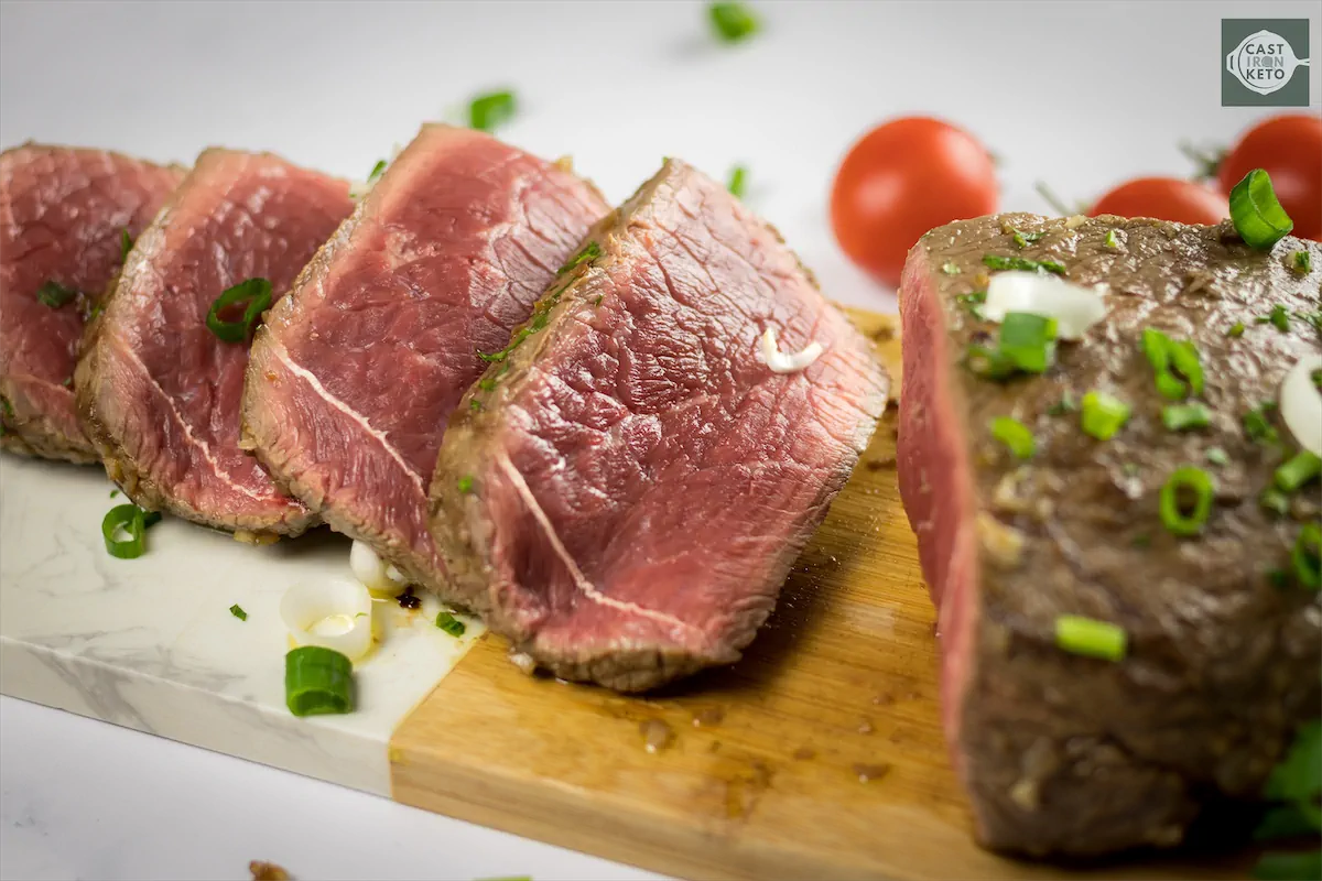 Perfectly cooked, sliced London broil presentation.