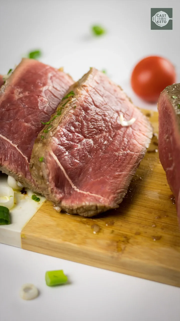 Close-up of juicy London broil slices.