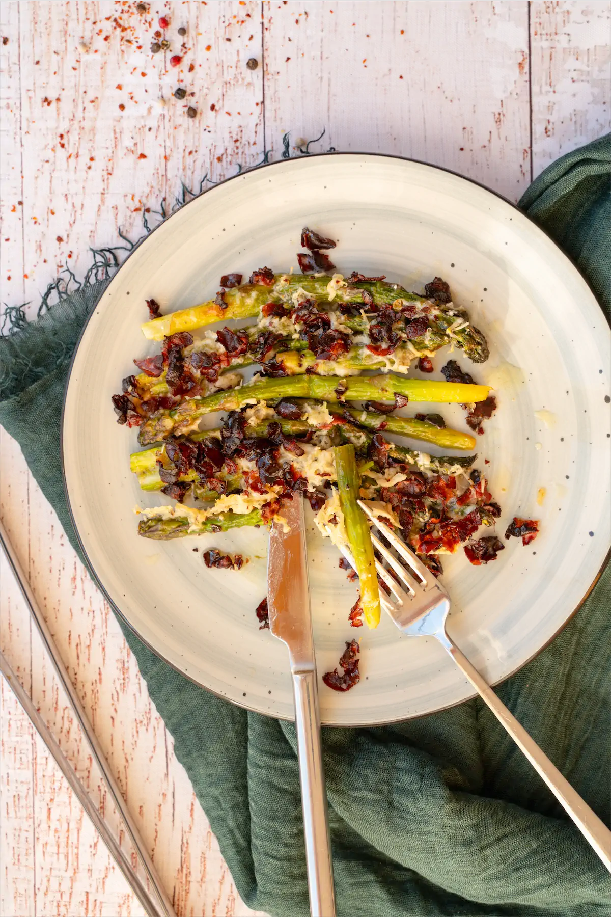 Low carb and homemade roasted asparagus with bacon crumbs and parmesan cheese.