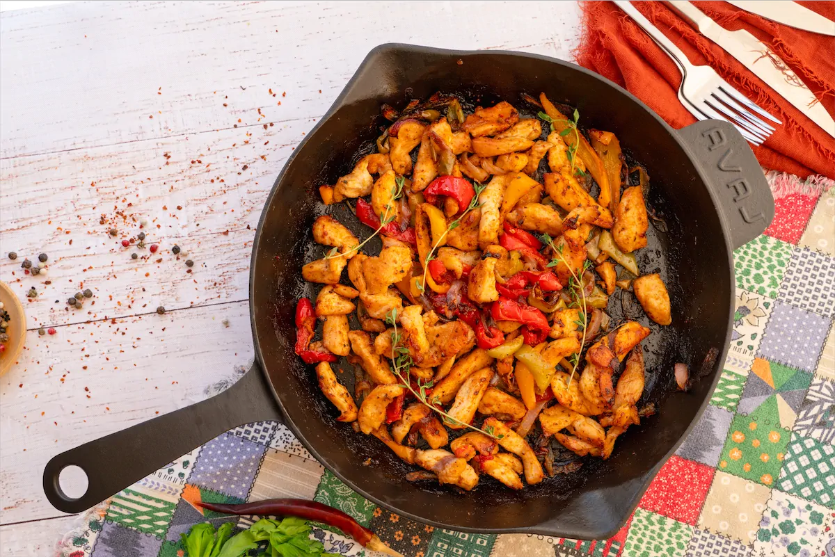 Fajita chicken recipe in a cast iron pan.