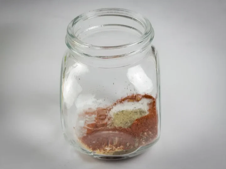 Keto seasoning in a glass jar.