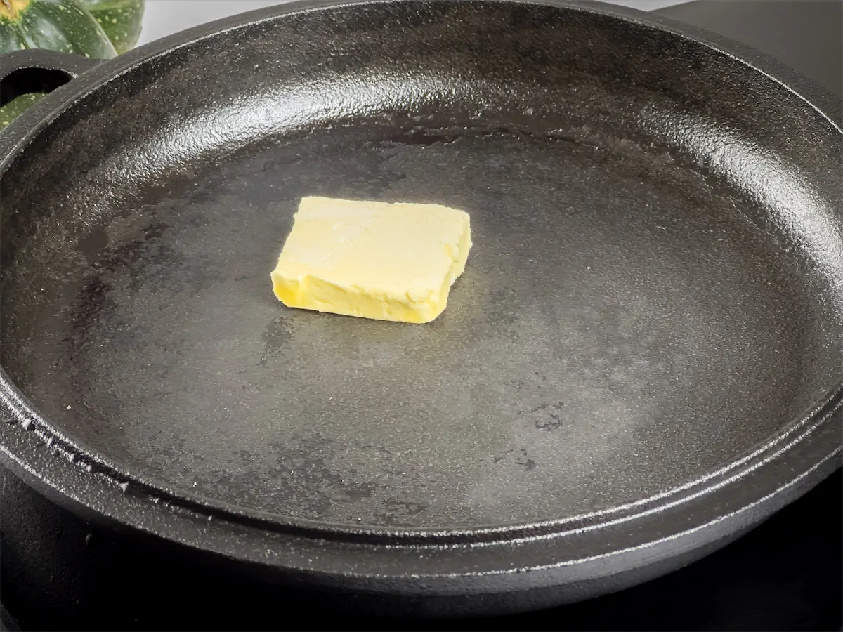 Butter in a cast iron skillet.