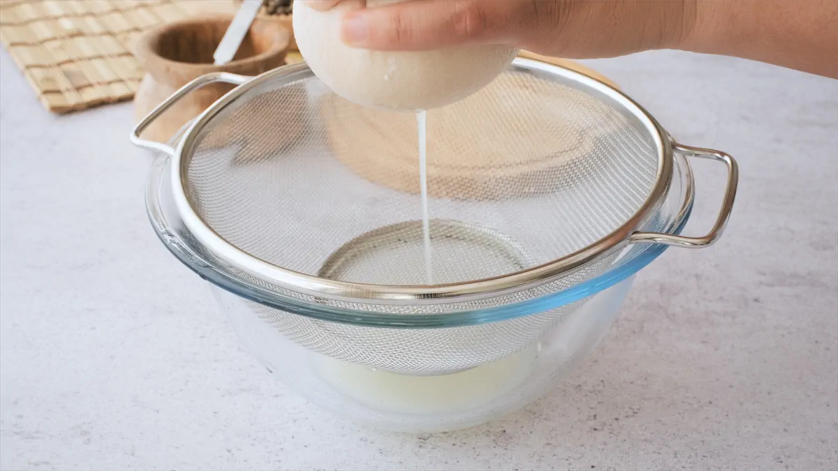 Straining yogurt.