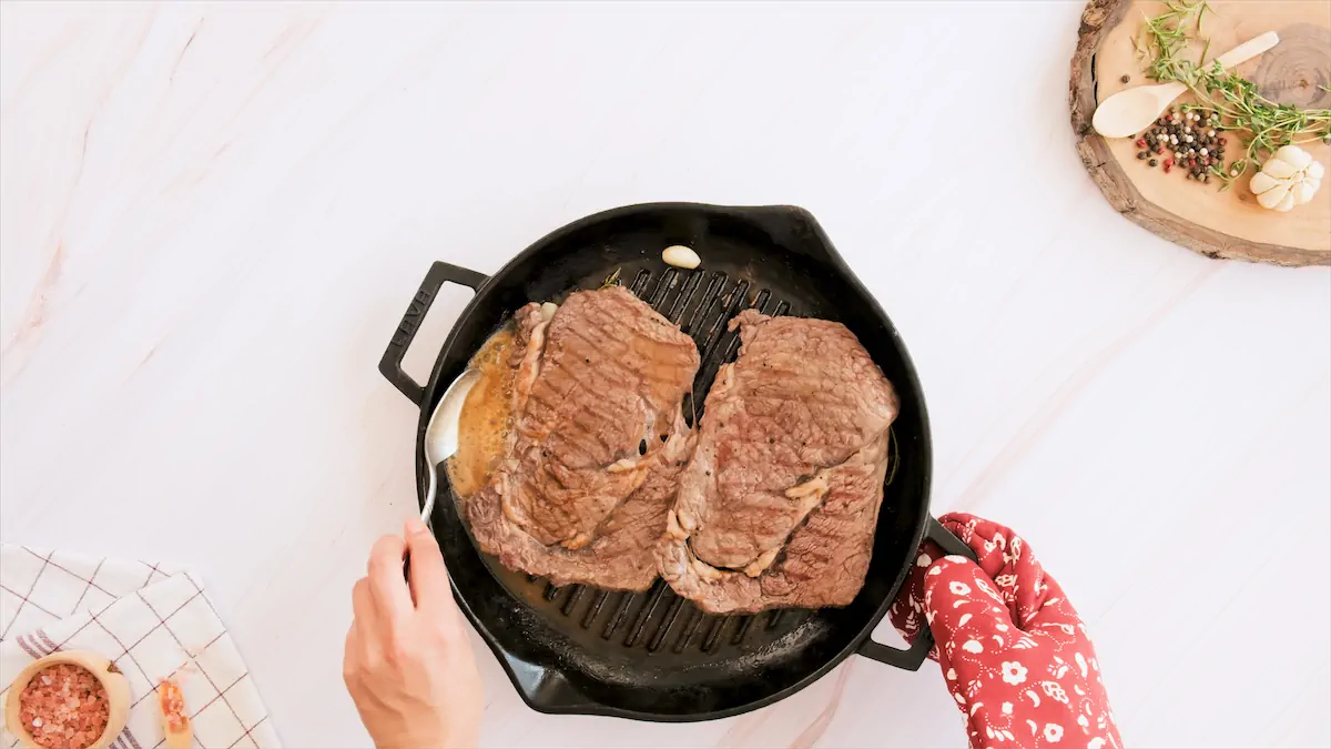 Steaks cooked in a grill pan.
